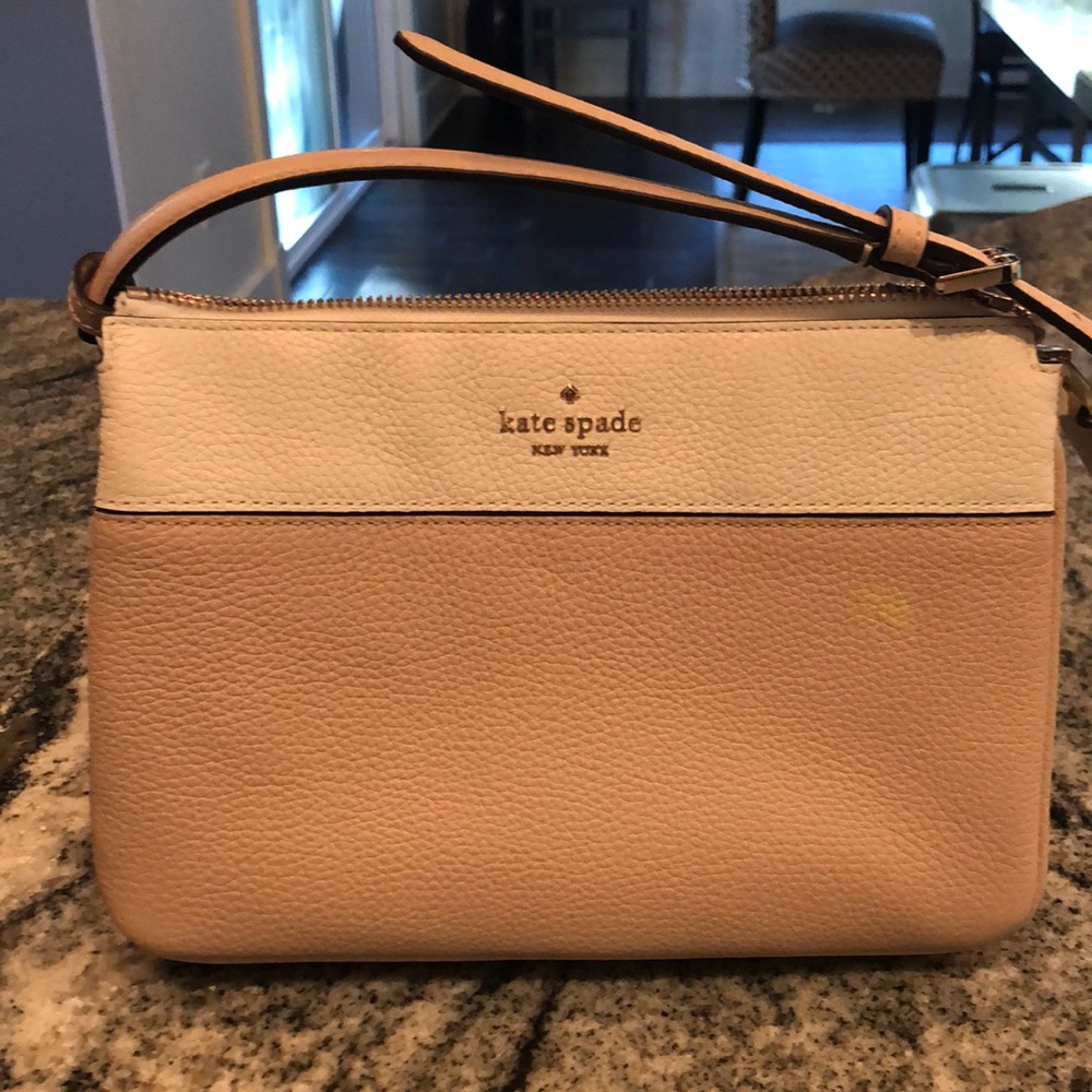 Kate spade tan and white bag.